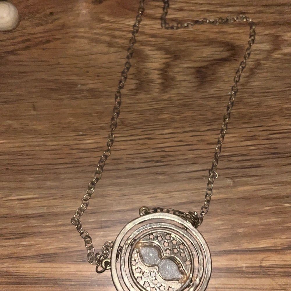 Cute inscripted time turner necklace